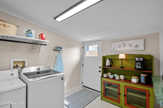 laundry area with washing machine and dryer