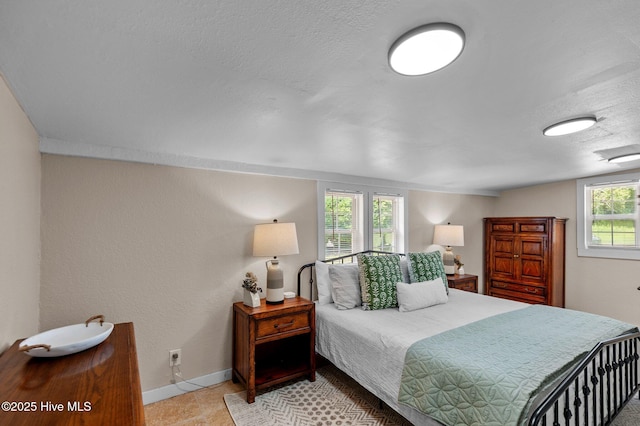 bedroom featuring a textured ceiling