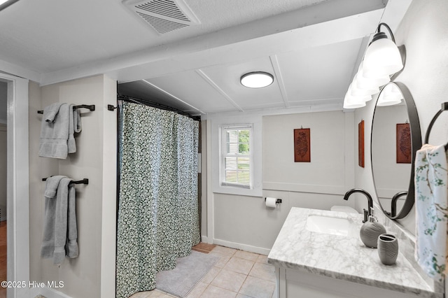 bathroom featuring tile patterned floors, vanity, and a shower with shower curtain