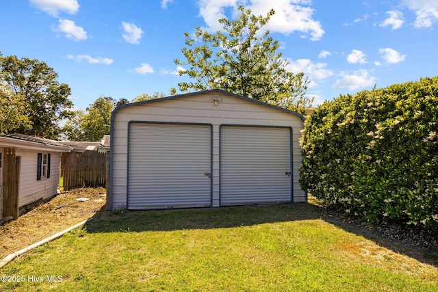 garage with a yard