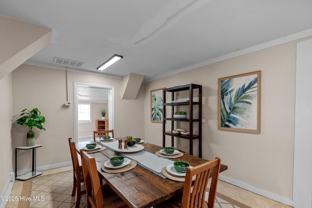 view of tiled dining space