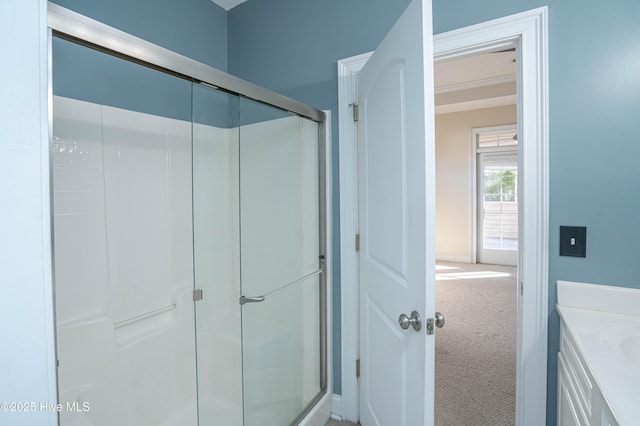 bathroom with vanity and an enclosed shower