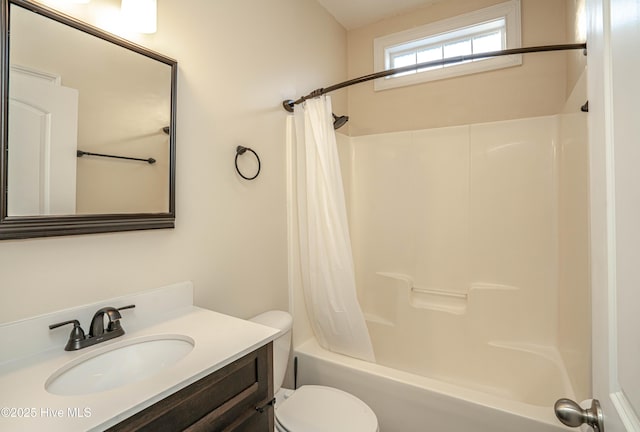 full bathroom with vanity, shower / bathtub combination with curtain, and toilet