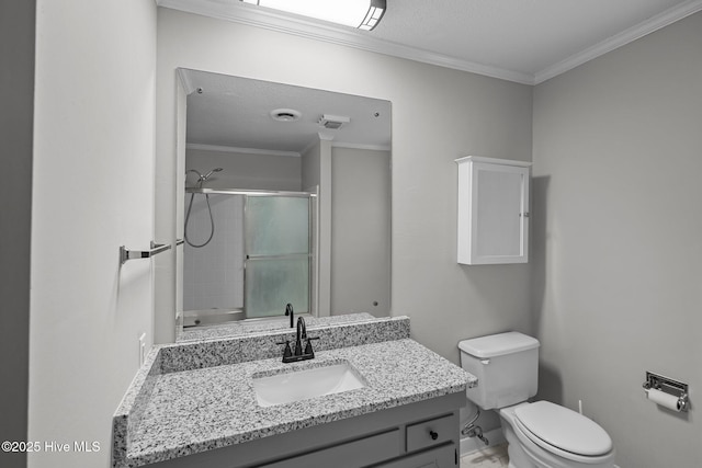 bathroom featuring vanity, a textured ceiling, toilet, and a shower with door