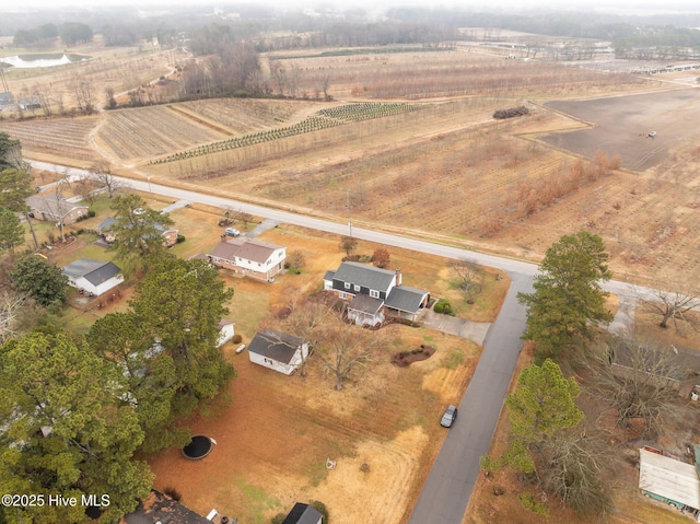 birds eye view of property featuring a rural view