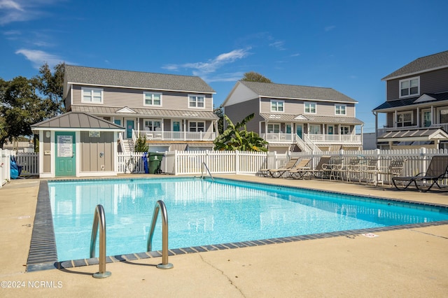 view of pool featuring a patio