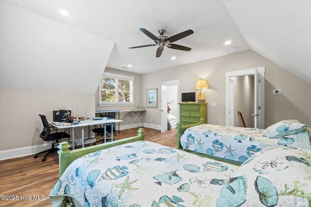 bedroom featuring recessed lighting, lofted ceiling, baseboards, and wood finished floors