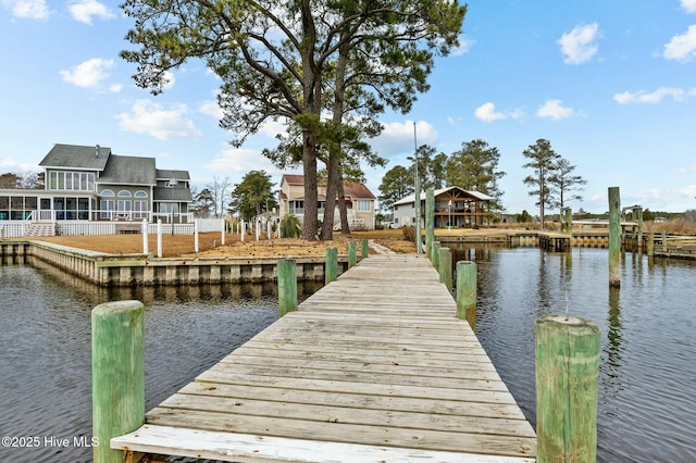 dock area featuring a water view