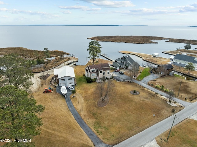 drone / aerial view with a water view