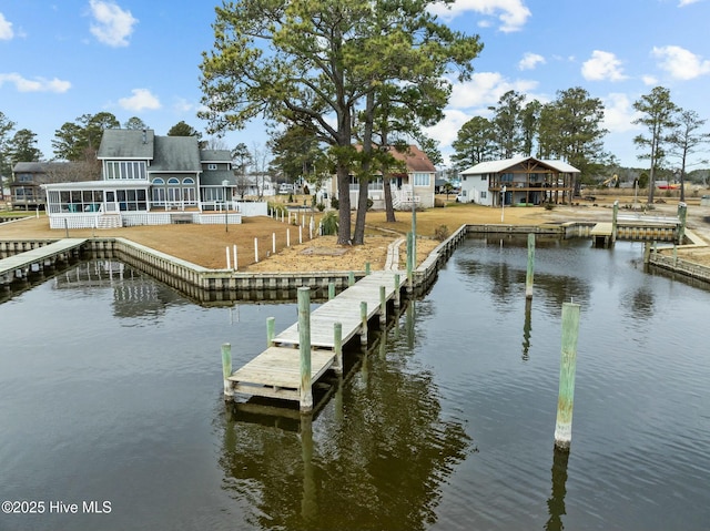 dock area featuring a water view