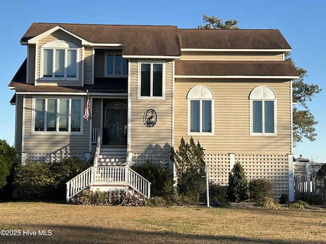 view of front of property with a front lawn