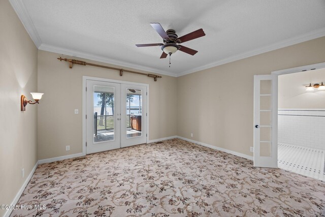 530 E St, Belhaven, NC 27810 - carpeted spare room with crown molding, ceiling fan, baseboards, and french doors