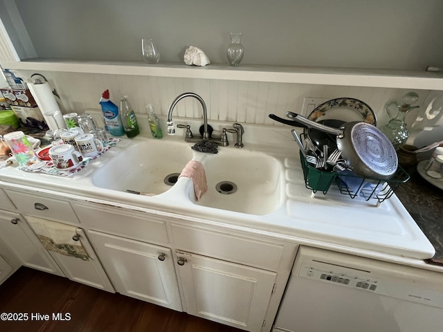 bathroom featuring sink and hardwood / wood-style flooring