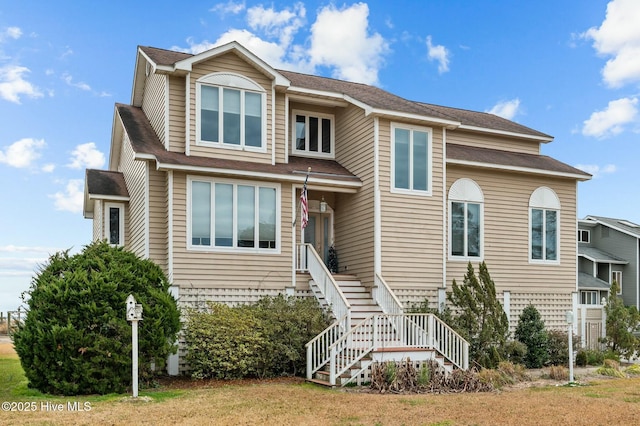 view of front of house with a front lawn