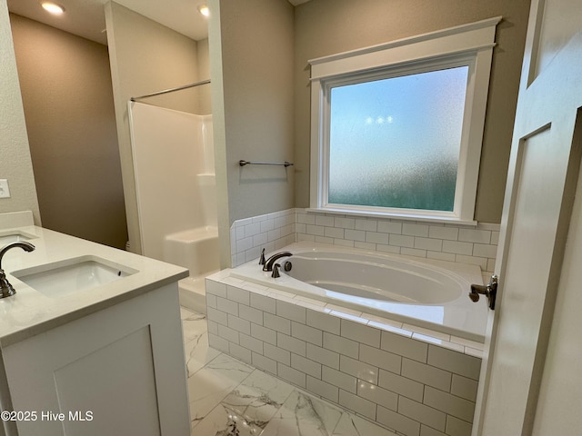 bathroom featuring independent shower and bath and vanity