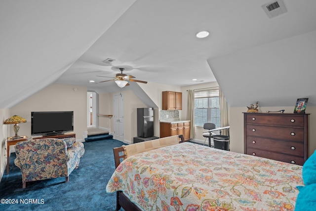 carpeted bedroom featuring vaulted ceiling and ceiling fan