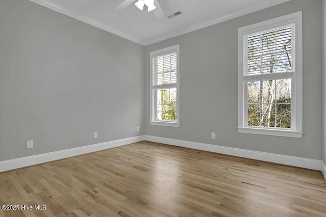 spare room with ceiling fan, light hardwood / wood-style flooring, and ornamental molding