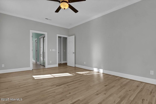 unfurnished bedroom featuring ceiling fan, crown molding, and light hardwood / wood-style floors