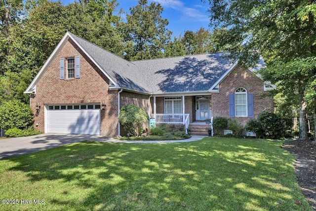 front facade featuring covered porch, a garage, and a front lawn