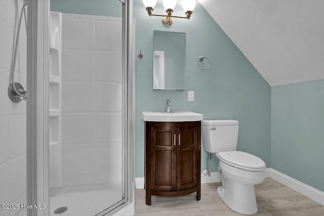 bathroom featuring vanity, vaulted ceiling, toilet, walk in shower, and a chandelier