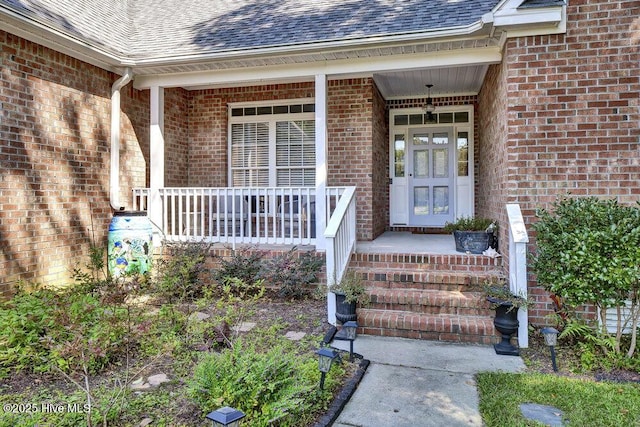 doorway to property with covered porch