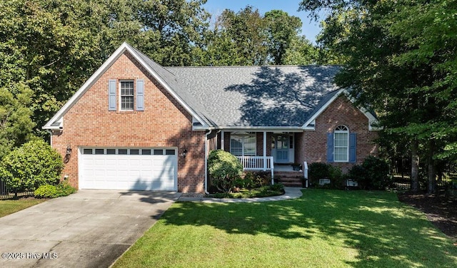 view of front facade with a front lawn, a porch, and a garage