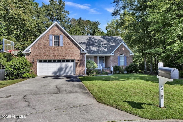 front of property featuring covered porch, a garage, and a front yard