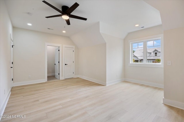 bonus room with vaulted ceiling, ceiling fan, and light hardwood / wood-style floors