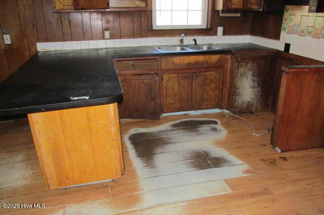 53 Bowmanville Dr, Fairmont, NC 28340 - kitchen with sink and light hardwood / wood-style floors