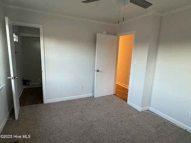 unfurnished bedroom with carpet, ceiling fan, and ornamental molding