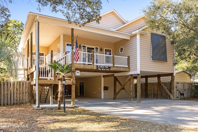 view of front facade with a carport