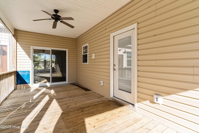 wooden deck with ceiling fan