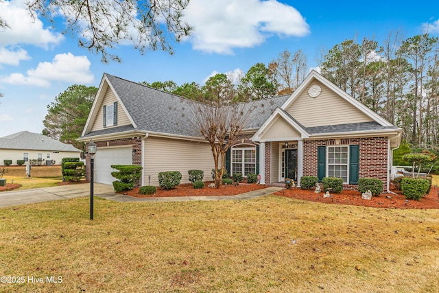 view of front facade featuring a garage and a front lawn