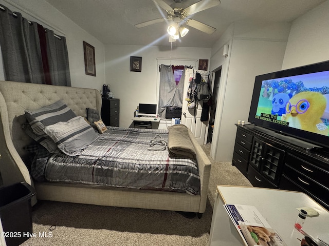 carpeted bedroom with ceiling fan