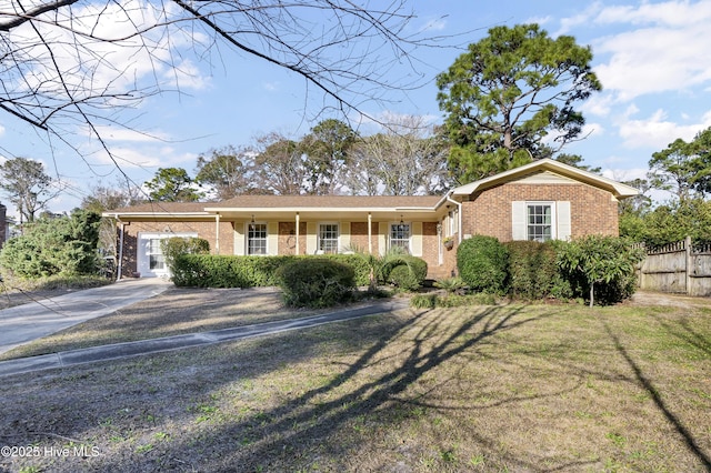 ranch-style home with a front yard