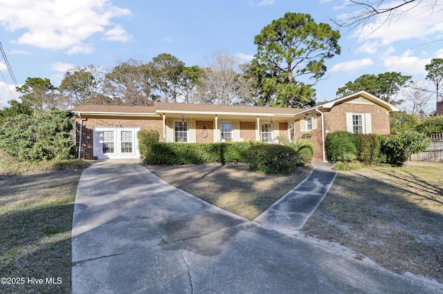 single story home featuring french doors