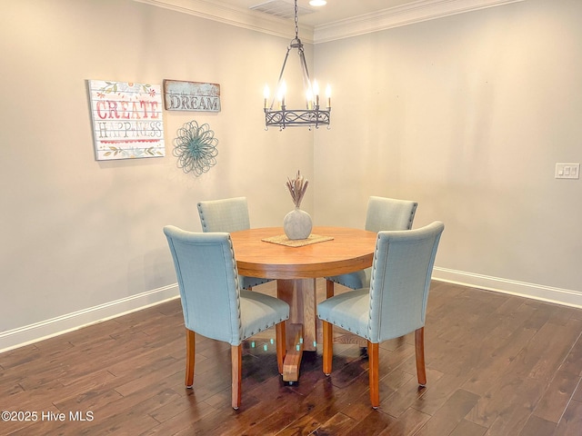 dining area featuring crown molding, a chandelier, and dark hardwood / wood-style flooring