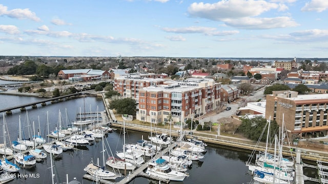 birds eye view of property featuring a water view