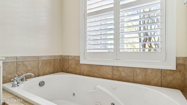 bathroom with tiled bath