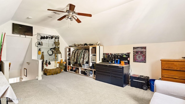 carpeted bedroom featuring ceiling fan and vaulted ceiling