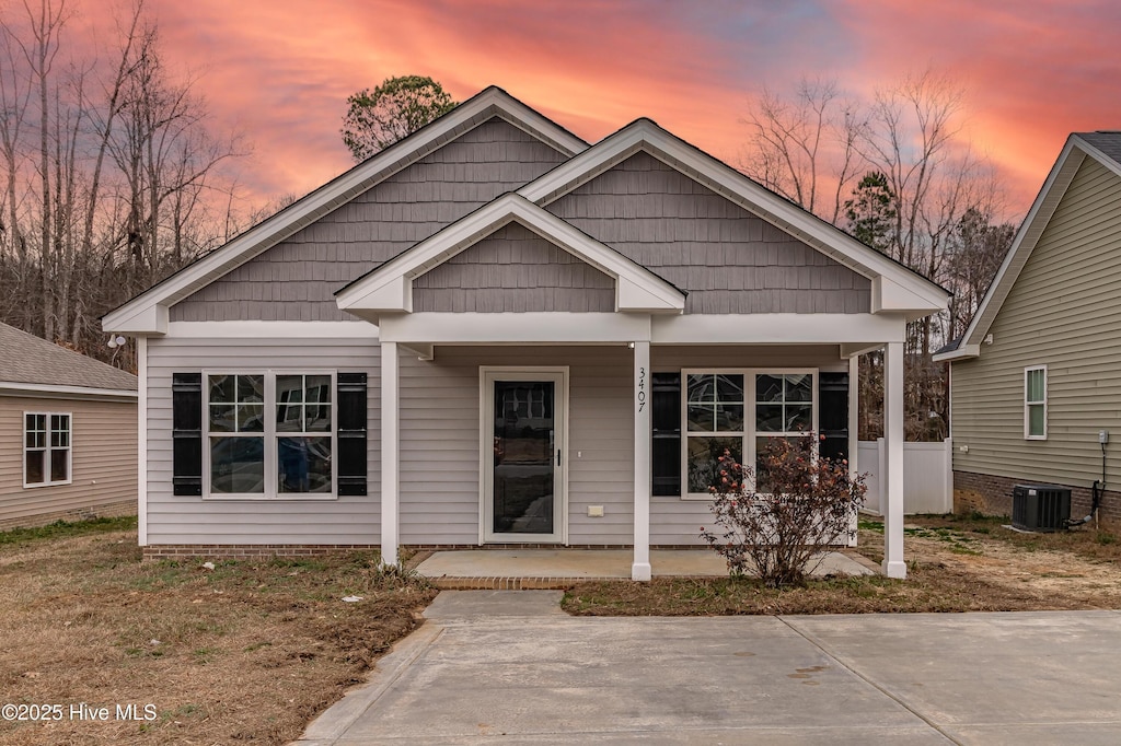 3407 Cranberry Ridge Dr SW, Wilson, NC 27893 - view of front of property with covered porch and cooling unit