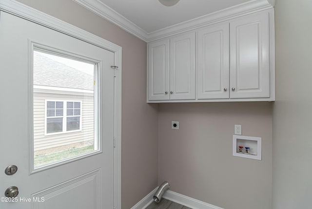 laundry room with crown molding, cabinets, washer hookup, and hookup for an electric dryer