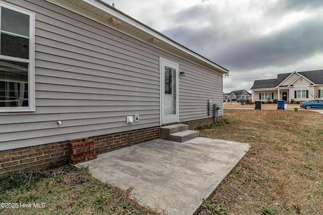 exterior space featuring a patio area and a yard