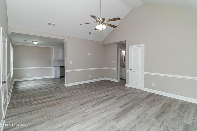 unfurnished room featuring ceiling fan, light hardwood / wood-style floors, and high vaulted ceiling