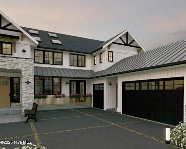 modern farmhouse with a garage