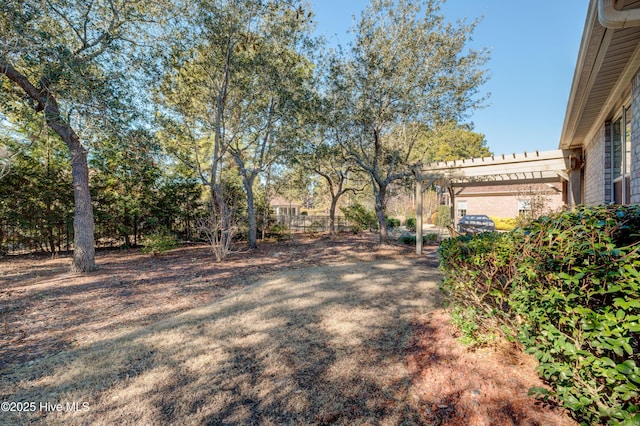 view of yard with a pergola