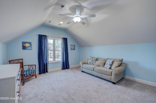 interior space featuring vaulted ceiling, light carpet, and ceiling fan