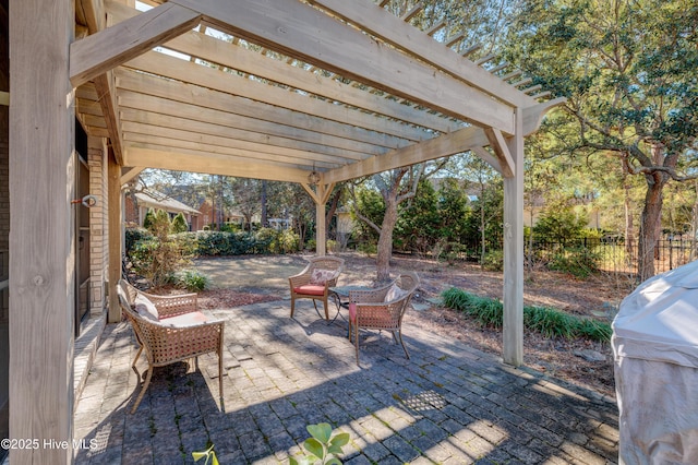 view of patio featuring a pergola and grilling area