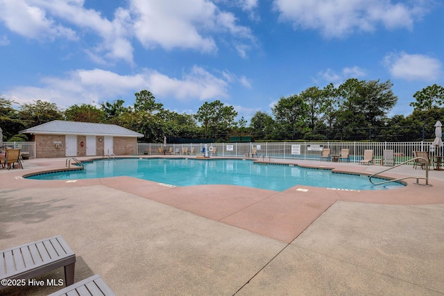 view of swimming pool featuring a patio