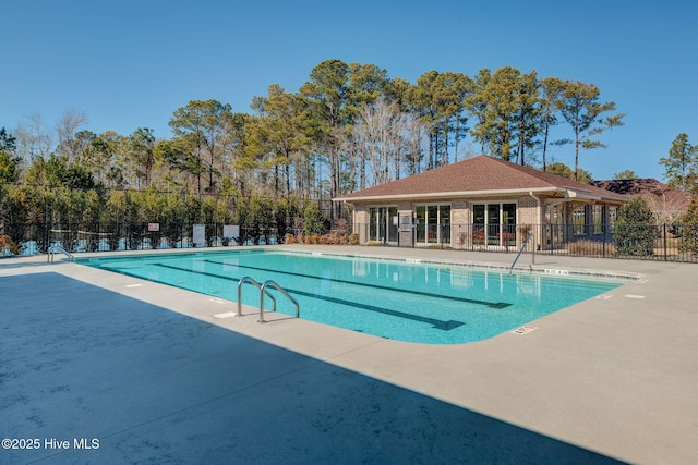 view of swimming pool with a patio area